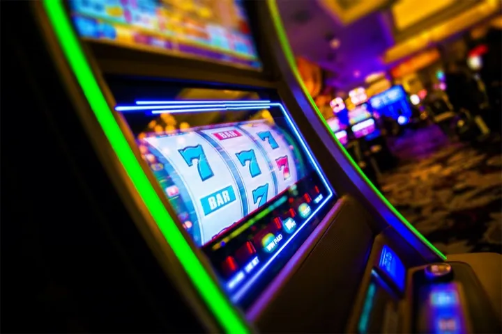 Green light slot machine at Red Casino location at The Pyramid at Grand Oasis Hotel